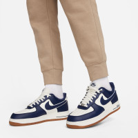 Pantalon de survêtement en polaire Nike Sportswear Club beige blanc