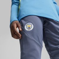 PUMA Manchester City Pantalon d'Entraînement 2024-2025 Enfants Bleu Foncé Bleu Clair