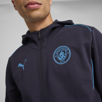 PUMA Manchester City Casuals Trainingspak Full-Zip 2024-2025 Donkerblauw Blauw