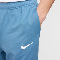 Pantalon d'entraînement Nike Strike bleu clair blanc