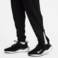 Pantalon d'entraînement tissé Nike Challenger noir et argenté