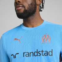 PUMA Olympique Marseille Trainingsshirt 2024-2025 Lichtblauw Zwart Brons